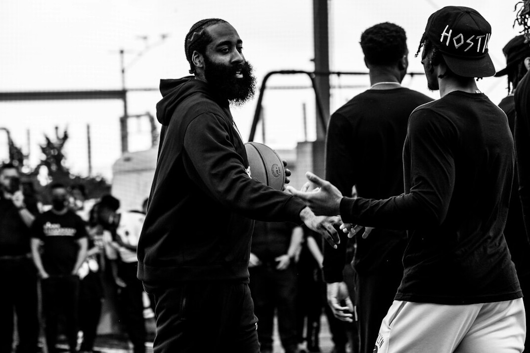 Coworkers congratulating each other with a handshake